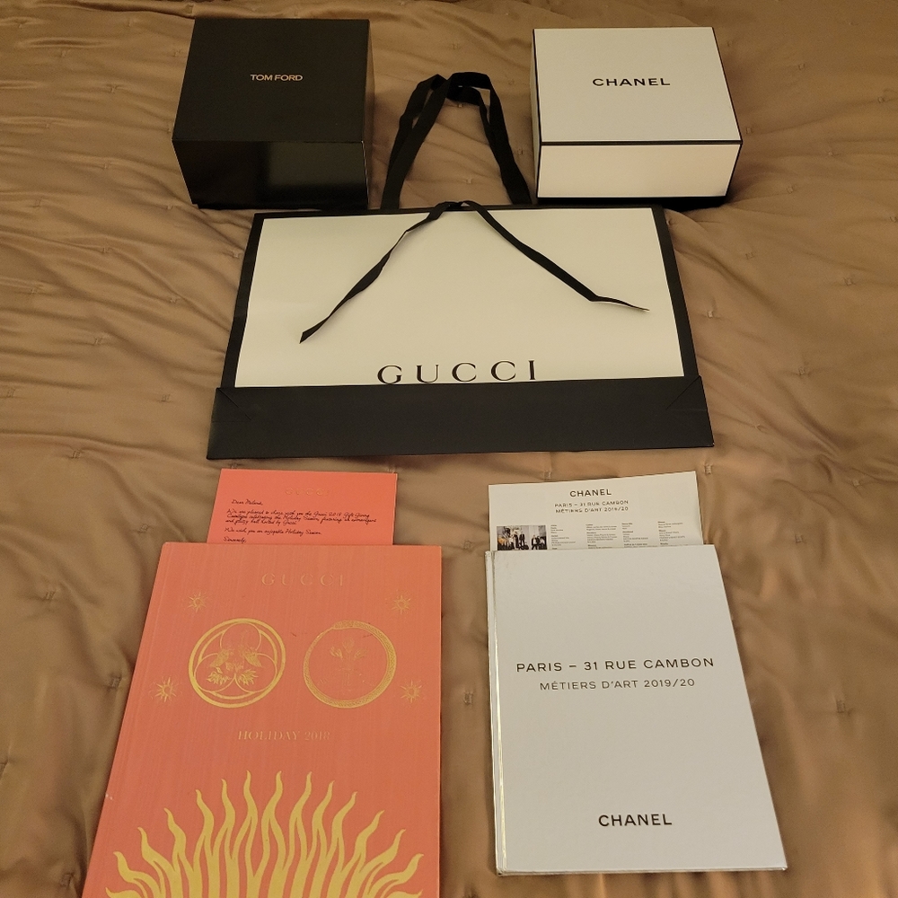 Variety lot of boxes, bag and books